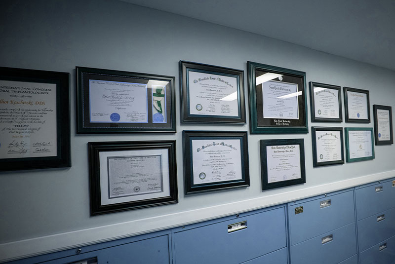 Long Island Implant and Cosmetic Dentistry Wall Of Diplomas